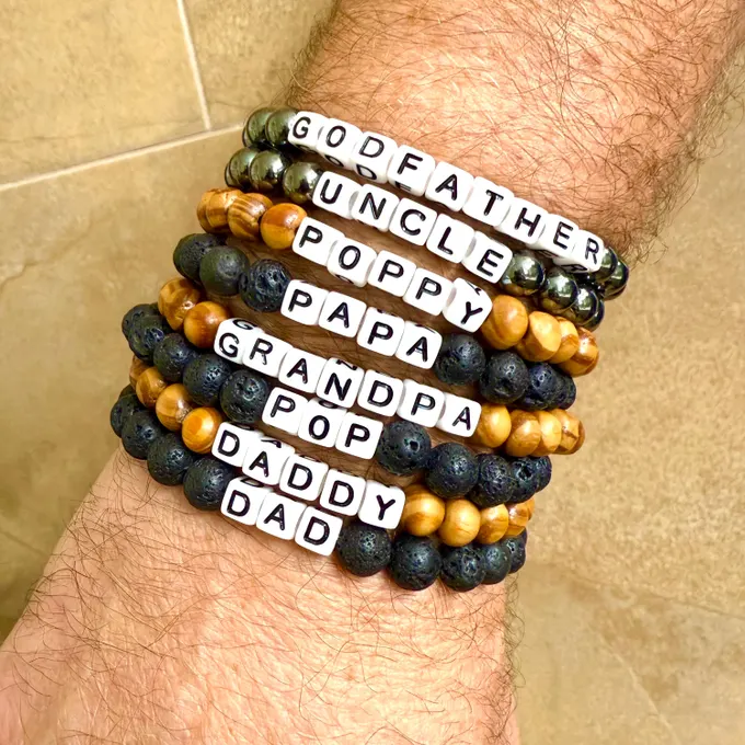 A Picture of Our Father's Day Bracelets on Wrist