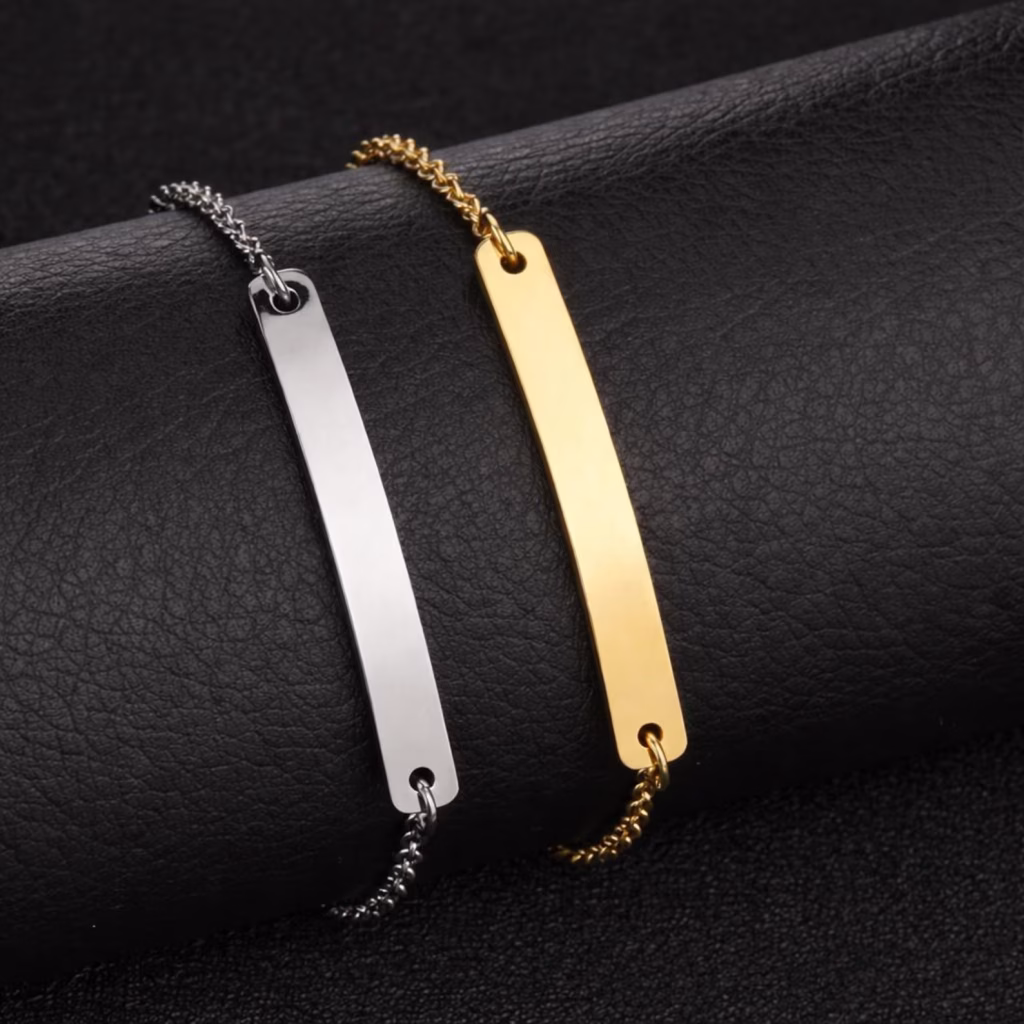 A Picture of Our Engravable Bar Bracelet in Stainless Steel and 18k Gold
